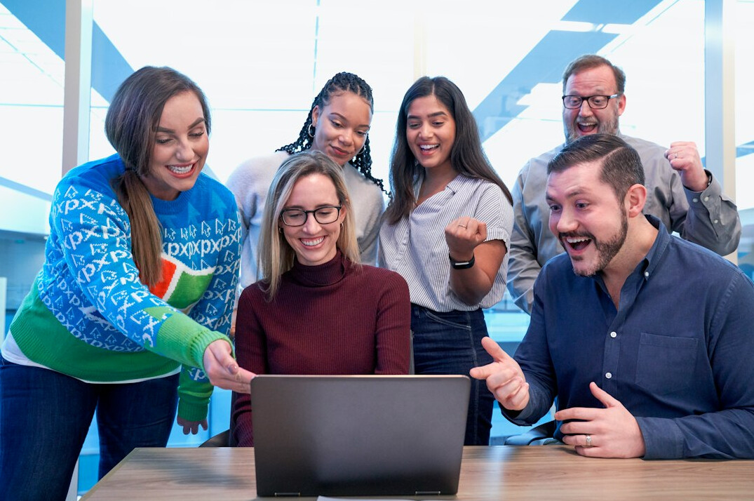 diverse it students collaborating